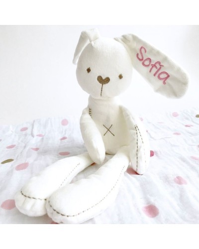 Canastilla bebe con pelele invernal en tonos rosas